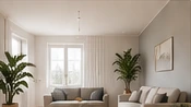 Heller Wohnraum mit Sofa und Pflanzen